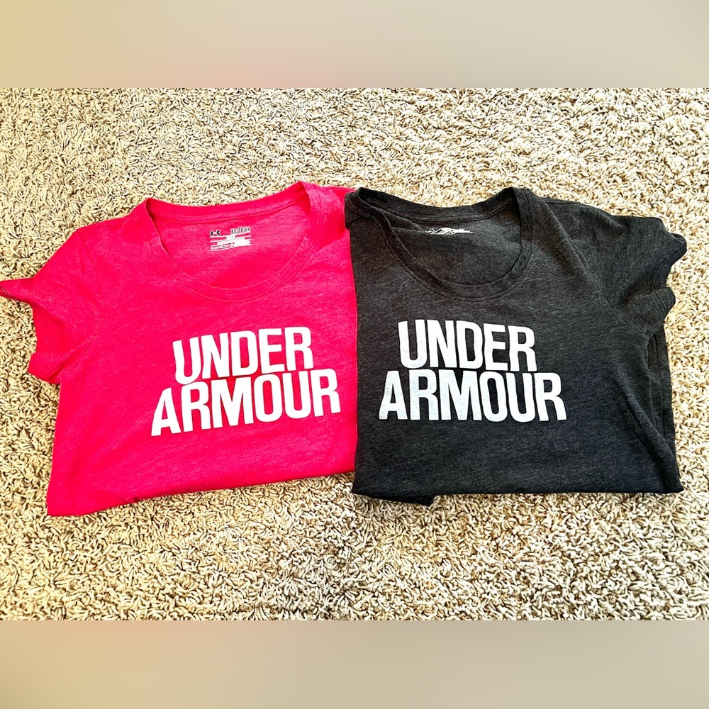 Two women’s UA workout t-shirts
